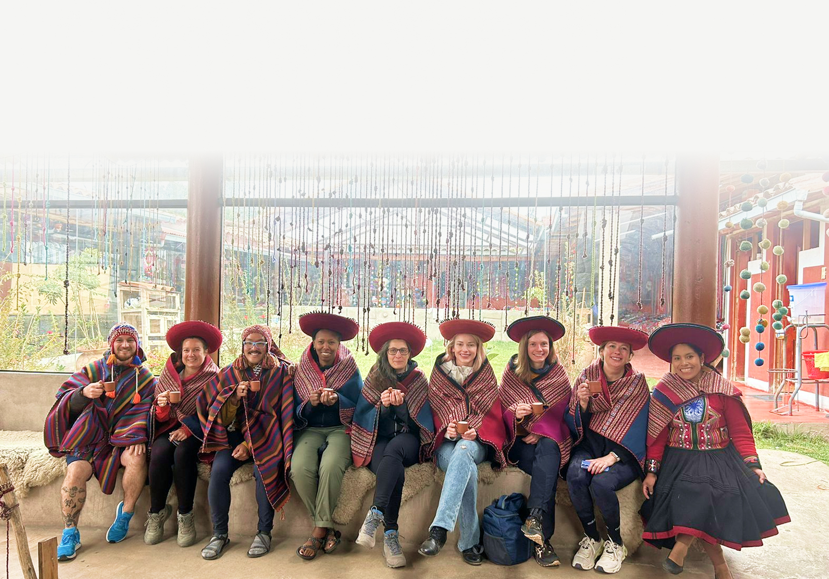 Smiling tourists enjoying a memorable travel experience in Peru with Valencia Travel Cusco