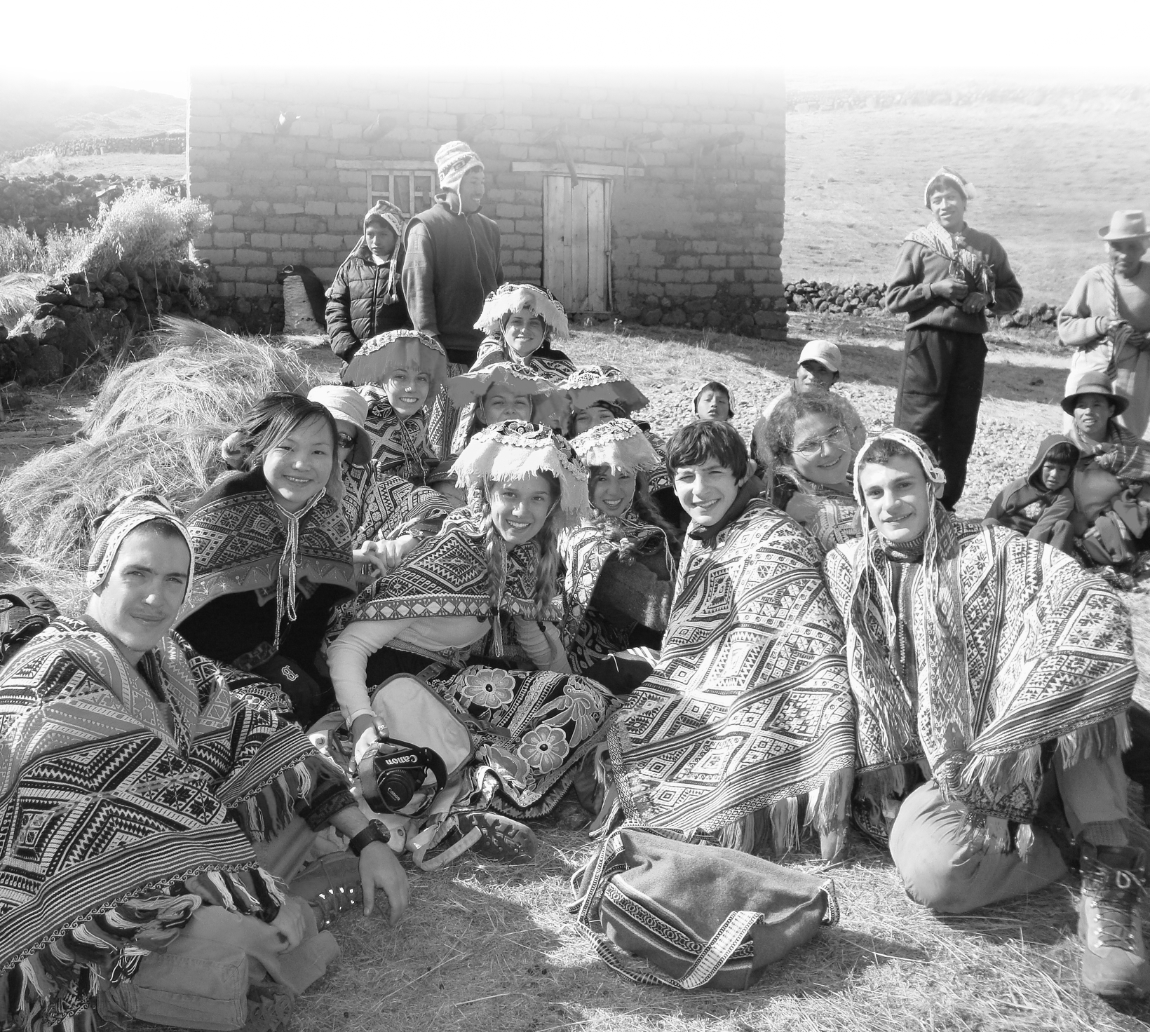 Travelers with backpacks discovering cultural highlights on a Valencia Travel Cusco tour in Peru